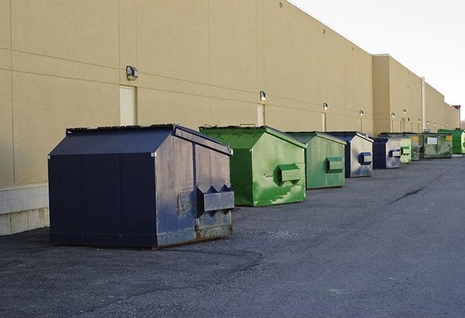 a large metal bin for waste disposal on the construction site in Blanchard LA